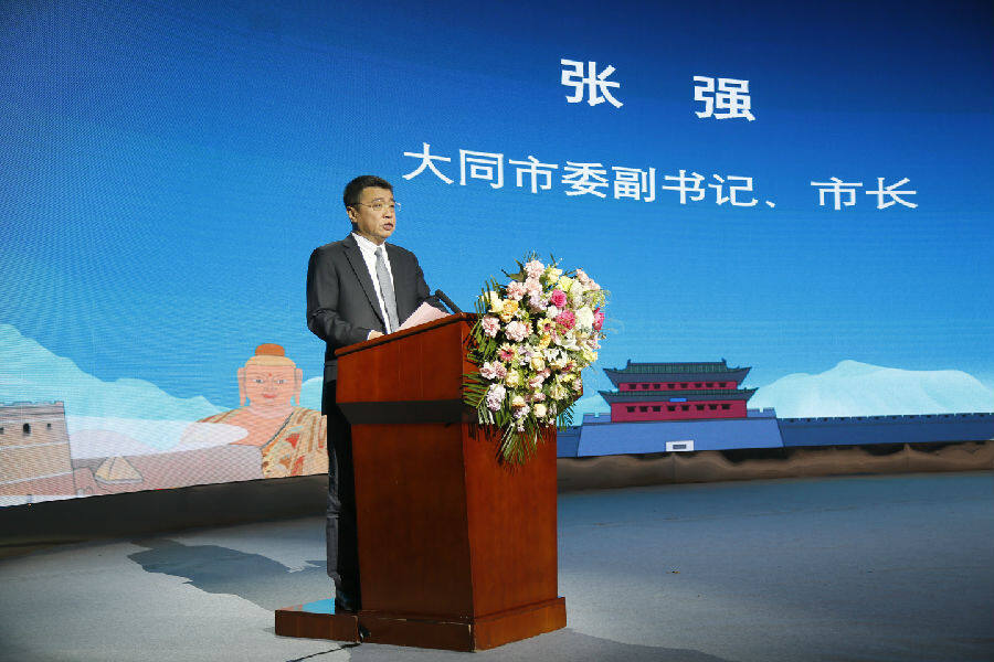 大同市市长张强在致辞中深情推介"中国古都·天下大同"(席兆平 摄)